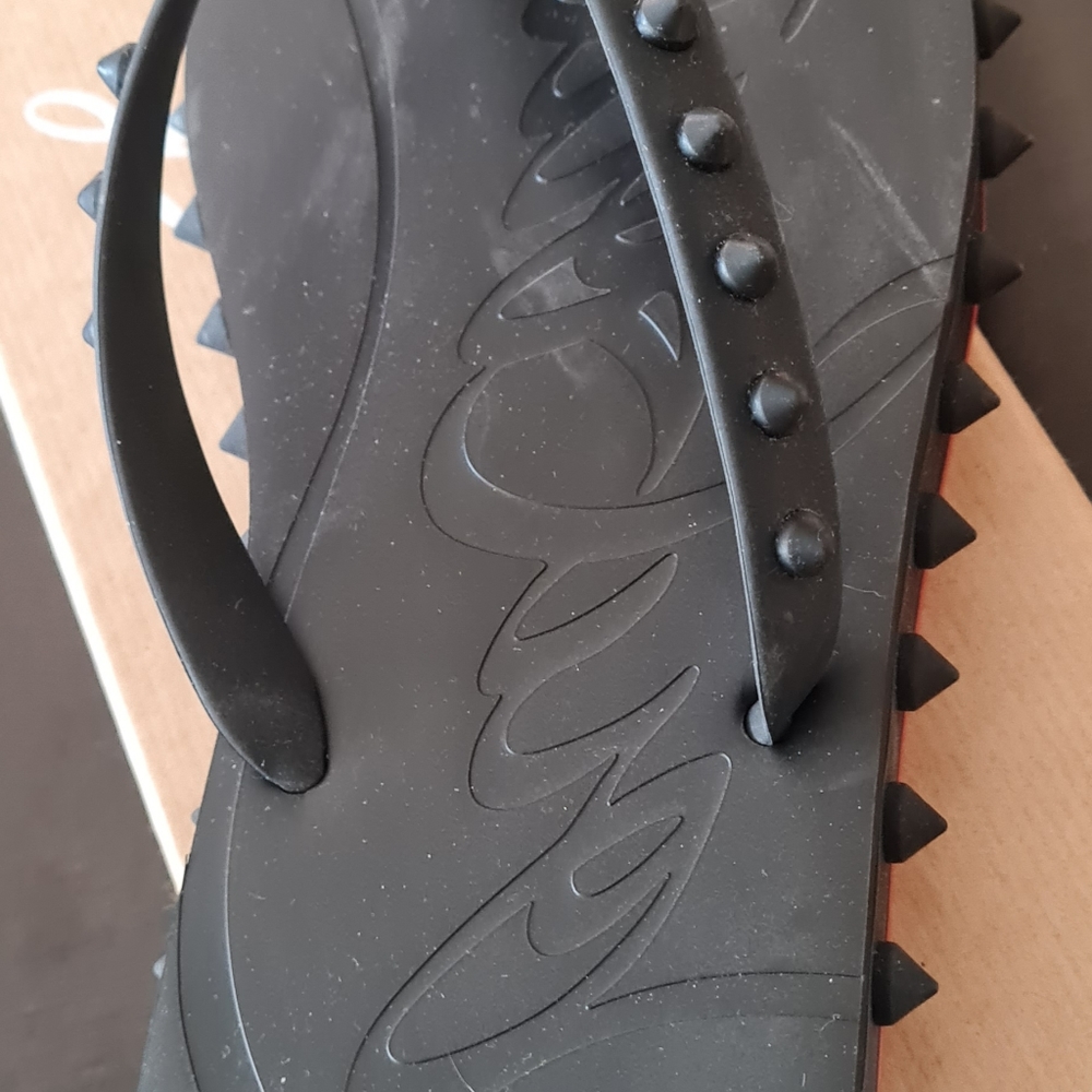 Christian Louboutin flip flops